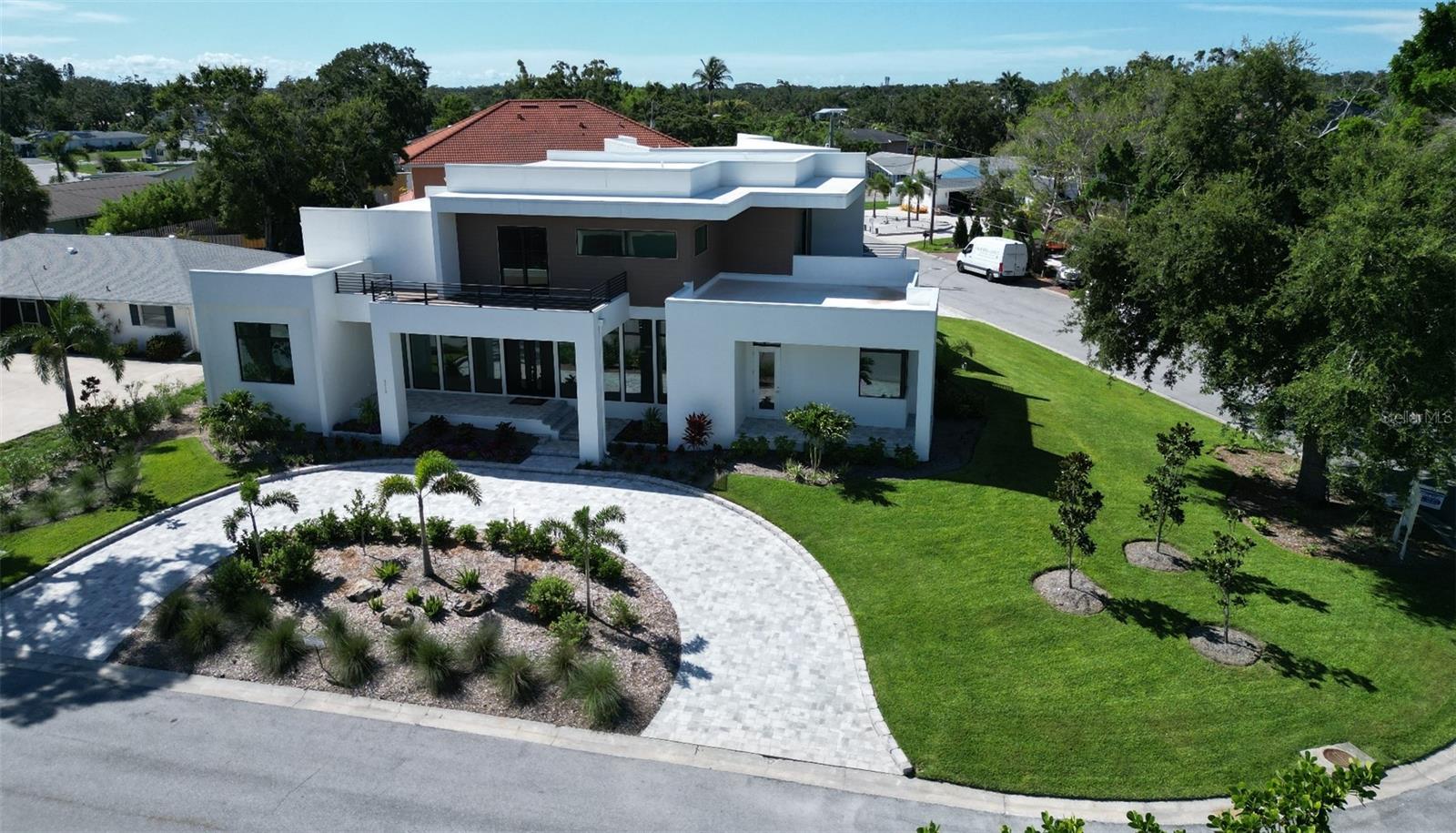 One or more photo(s) has been virtually staged. Stunning New Custom Home – Mid-Sarasota County – COQUINA ISLAND! Completion – Summer 2025, Move In Ready
This one-of-a-kind, executive home is located on a spacious lot in the heart of Sarasota County on Coquina Island, offering modern luxury and timeless design. Situated just minutes from Siesta Key Beach, top-tier shopping, dining, Sarasota Memorial Hospital, Selby Gardens, and downtown Sarasota’s Marina Jack’s, this home enjoys a prime location.
Key Features:
4 or 5 Bedrooms | 5 1/2 Bathrooms
38' Wide Polyaspartic Garage with high ceilings, music speakers and 2 ceiling fans (space affords lifts in each bay)
13' High Ceilings in the great room
Gourmet Kitchen with sleek appliances, large island, cooktop hood, double wall ovens, coffee bar, and expansive walk-in pantry with custom shelving and room for a full freezer or refrigerator.
Spacious Master Suite with walk-out lanai, his and hers walk-in custom closets
Private Outdoor Spaces including multiple decks and a large paver lanai overlooking the Pebble-Tec heated saltwater pool with spillover spa
Separate Suite above the garage with a full kitchen, bath, bedroom, laundry, and balcony—perfect for guests or as an in-law suite
Energy Efficient with Icynene insulation, soundproofed walls, and potential for solar power
3 HVAC units and zones
Instant hot water heater; separate water heater for guest or in-law suite
Interior Highlights:
High-end finishes and custom-built staircases
Wood and tile floors throughout
Floor-to-ceiling windows flood the home with natural light
Fully structured wiring for sound; 19 music speakers and security cameras
Large laundry room with custom cabinetry, laundry sink, folding counter and hanging rod
Spacious pantry with custom shelves; electric dedicated circuit for additional freezer and/or refrigerator
Insulation in walls & ceiling for sound mitigation
WiFi mesh
Outdoor Oasis:
Heated Saltwater Pool & Spa with spillover waterfall and floor clean system
8 Outside security cameras
Outdoor Kitchen featuring marine-grade cabinets and a granite composite sink
Professionally designed tropical gardens with private well for the sprinkler system
LED Lit Circle Paver Driveway adds striking curb appeal
The home has been specifically designed for its setting, and offers incredible potential for a variety of uses—whether as your dream family home or a unique investment opportunity. Sellers are willing/able and flexible considering all offers to accommodate buyer wants and needs.