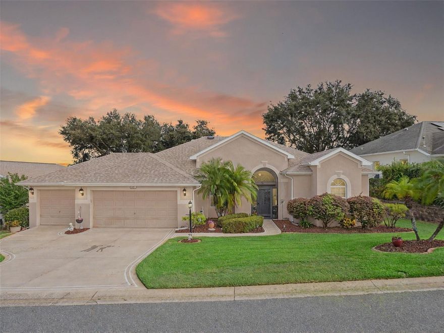 Welcome to your future home!  A place where comfort, style, and golf front living come together in perfect harmony.  This exceptional three-bedroom, two-bathroom Monarch Model home with a golf cart garage is an unparalleled opportunity for discerning buyers looking for their Florida retreat.  A home built for entertaining with stunning curb appeal, guaranteed to captivate you upon arrival.  The double door screened entry has a stately elegance and draws your eyes to the 16th fairway through the glass sliding doors.  The interior space has been thoughtfully designed with both formal and casual dining and living areas.  For the culinary enthusiast, the kitchen features stainless appliances just two years young!  Generous prep space with seating, open concept, and access to the Florida Room overlooking the golf course will only pique your interest.  The details include crown molding, split bedroom floor plan, a Summer Kitchen with gas grill & sink, Pebble Floor, expanded outdoor area with screen enclosure, and lots of closet space!  The primary suite provides it's owners a Roman Shower, Garden Tub, solid surface counters, and private commode.  The guest quarters are just as lovely and give your family privacy and comfort with ample closets and plenty of room.  Additionally, the home offers built-ins, an extra refrigerator in the golf cart garage, arched windows, and views of the course from nearly every room!  If space with high ceilings, views, and gorgeous curb appeal are must-haves, this could be the ONE!  2024 Roof!  2020 HVAC! Call for a tour today!  Royal Highlands is an active 55+ golf community with two pools, fitness center, courts, Great Hall, restaurant and more!  Great proximity to the turnpike, airports, shopping and amusement parks.  Come see what Lake County, Florida has to offer you!