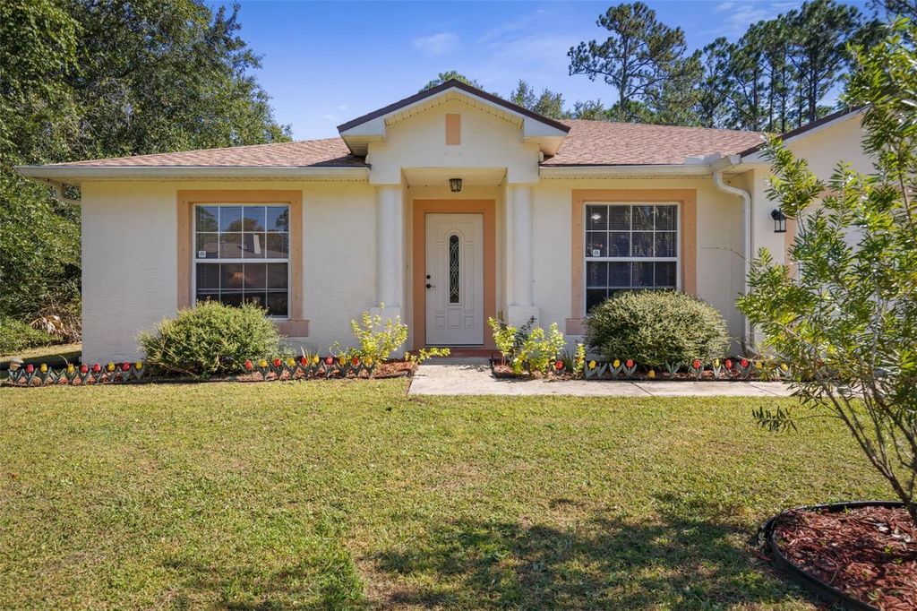 Photo of 81 Parkway Drive, Palm Coast, FL 32164 (MLS # FC313860)