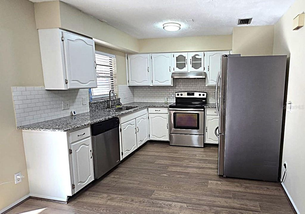 Photo of 5160 Glasgow Avenue, Orlando, FL 32819 (MLS # O6378903)