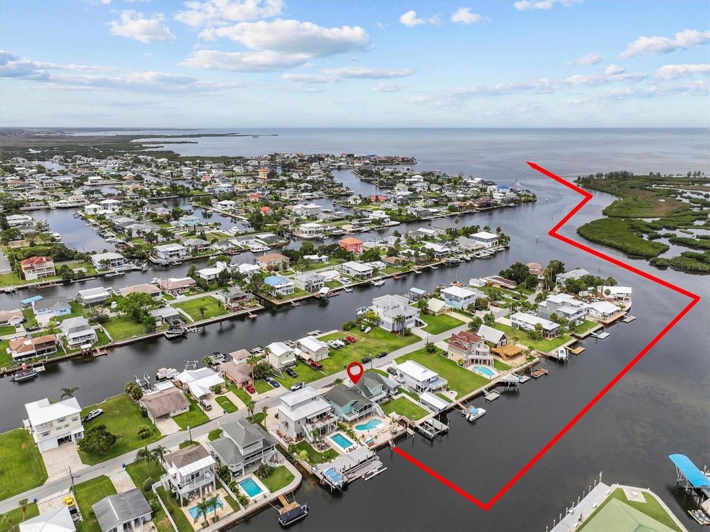 Photo of 3337 Mangrove Drive, Hernando Beach, FL 34607 (MLS # W7876978)