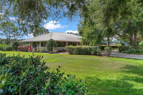 Photo of 13410 Deer Meadow Lane, Grand Island, FL 32735 (MLS # G5102391)