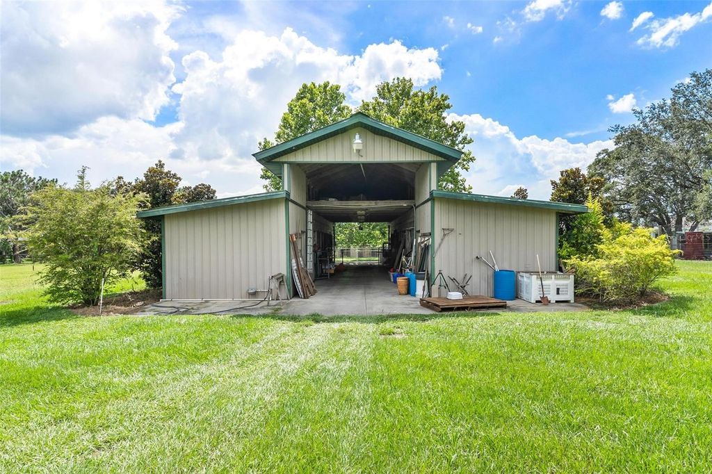 Photo of 13410 Deer Meadow Lane, Grand Island, FL 32735 (MLS # G5102391)