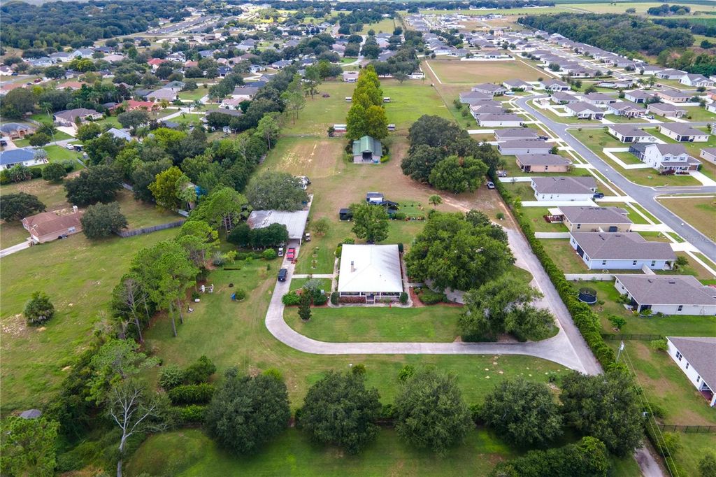 Photo of 13410 Deer Meadow Lane, Grand Island, FL 32735 (MLS # G5102391)