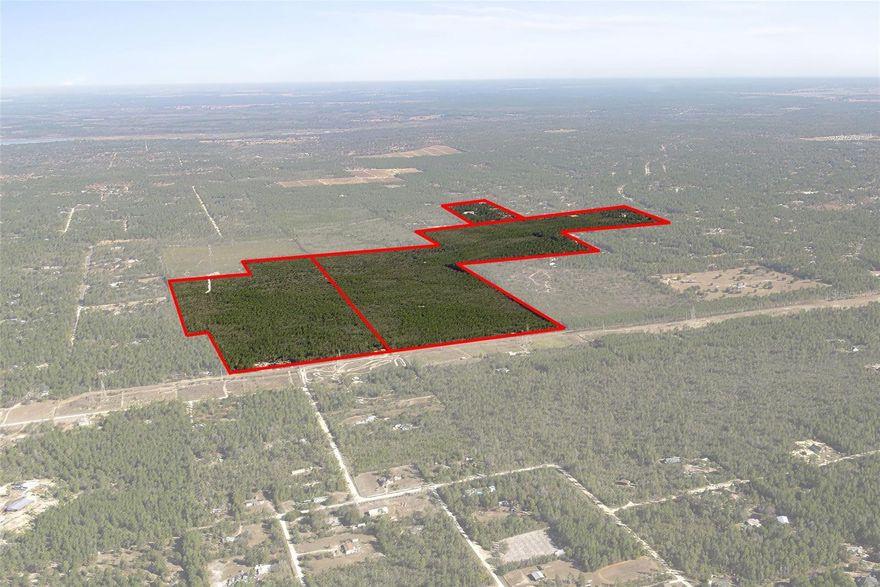 Presented for acquisition is a rare, high-and-dry ±368-acre land assemblage with three points of legal road access in Citrus County, Florida, strategically positioned within the Tampa–St. Petersburg MSA—one of the nation’s fastest-growing regions with over 3.3 million residents. Citrus County continues to capture value-driven in-migration as growth expands north from Tampa. The property offers strong regional connectivity, located minutes from Crystal River, Lecanto, Homosassa, Inverness, and the Ocala MSA. Access is further enhanced by the recently extended Suncoast Parkway, a $180 million state investment now reaching CR 486 with planned continuation toward US-19, placing the final expansion corridor near the site. Zoned RUR/MH, the assemblage sits between higher-density growth corridors and surrounding agricultural and conservation lands. The site includes 41 previously platted single-family lots averaging ±1.5 acres, providing near-term monetization potential. Remaining acreage supports residential development at one unit per ten acres, with density increases to one unit per five acres achievable through a Planned Unit Development (PUD). Permitted uses include single-family residential, agricultural operations, and water and wastewater utility facilities, with additional conditional uses such as assisted living, attached housing, communications infrastructure, and community-serving facilities—significantly expanding development optionality. Citrus County is actively advancing comprehensive plan updates under its 2050 Vision, transitioning away from legacy DRI structures toward expanded Public Service Areas and flexible development agreements. Additionally, the Florida Live Local Act offers a compelling entitlement-acceleration pathway, allowing limited workforce or affordable housing components to unlock zoning certainty, density flexibility, and compressed approval timelines. This offering represents a high-conviction land-banking and entitlement-arbitrage opportunity, combining near-term lot sales with mid-term entitlement upside and long-term value creation driven by infrastructure investment and sustained regional growth.