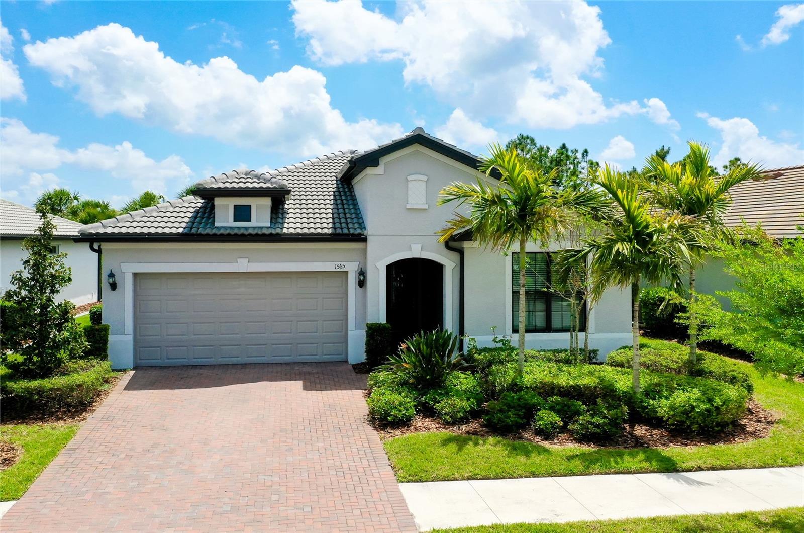 If Life is a journey, this is the destination!!!!! This beautiful 2/2/2 1,854sq ft home was built with tons of upgrades!
The spacious kitchen is a chef’s dream, Built in oven and confection oven and Stainless steel appliances a stylish tiled backsplash. Featuring stunning Quartz countertops, Large breakfast bar/Island has underneath storage, solid wood maple cabinets with crown molding, Plenty of cabinet space and a pantry for extra storage. In the kitchen behind the sink, (working area) the seller installed flooring for comfort on the feet, that can easily be removed, the tile is still under it. There is a special space right off the kitchen that can be used as a sunroom, dining room or whatever you desire. Then you can step out onto the screened in Lanai to enjoy those beautiful Florida days. Transient windows brighten up the master bath and the sunroom. Also has porcelain tile flooring. The master bedroom suite has a glass door walk in shower, with a railing for safety. Huge walk-in closet, dual granite sinks. The laundry room is very spacious and is in close proximity to the master bedroom. Brilliant idea! Also has a built in closet for more storage and a laundry tub!
The Den has double doors and can be used as an additional bedroom for extra guests or use it for media room! You will love this floor plan. The 2nd bedroom is in the front of the house and right next to the 2nd bathroom. The garage is spacious and has Epoxy flooring. Not in a flood zone. City water and sewage!!! Whether you're enjoying a peaceful evening on your private screened in patio or taking advantage of all the community has to enjoy... the pickle ball courts, bocce ball, billiard's, ping pong, horseshoes, library, internet café; to the numerous clubs and classes, crafters, bridge, poker, euchre, yoga, tai chi, water aerobics, dance club, and of course the Spa, Pool and Resistance pool for exercise, community garden and a dog park. So much to do in this 55+ community. Don't miss this amazing opportunity to enjoy resort-style living in the Del Webb Cypress Falls community! Call for your private showing today!