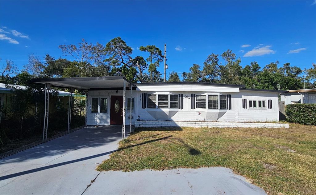 Photo of 12053 Fairway Avenue, Brooksville, FL 34613 (MLS # TB8445420)