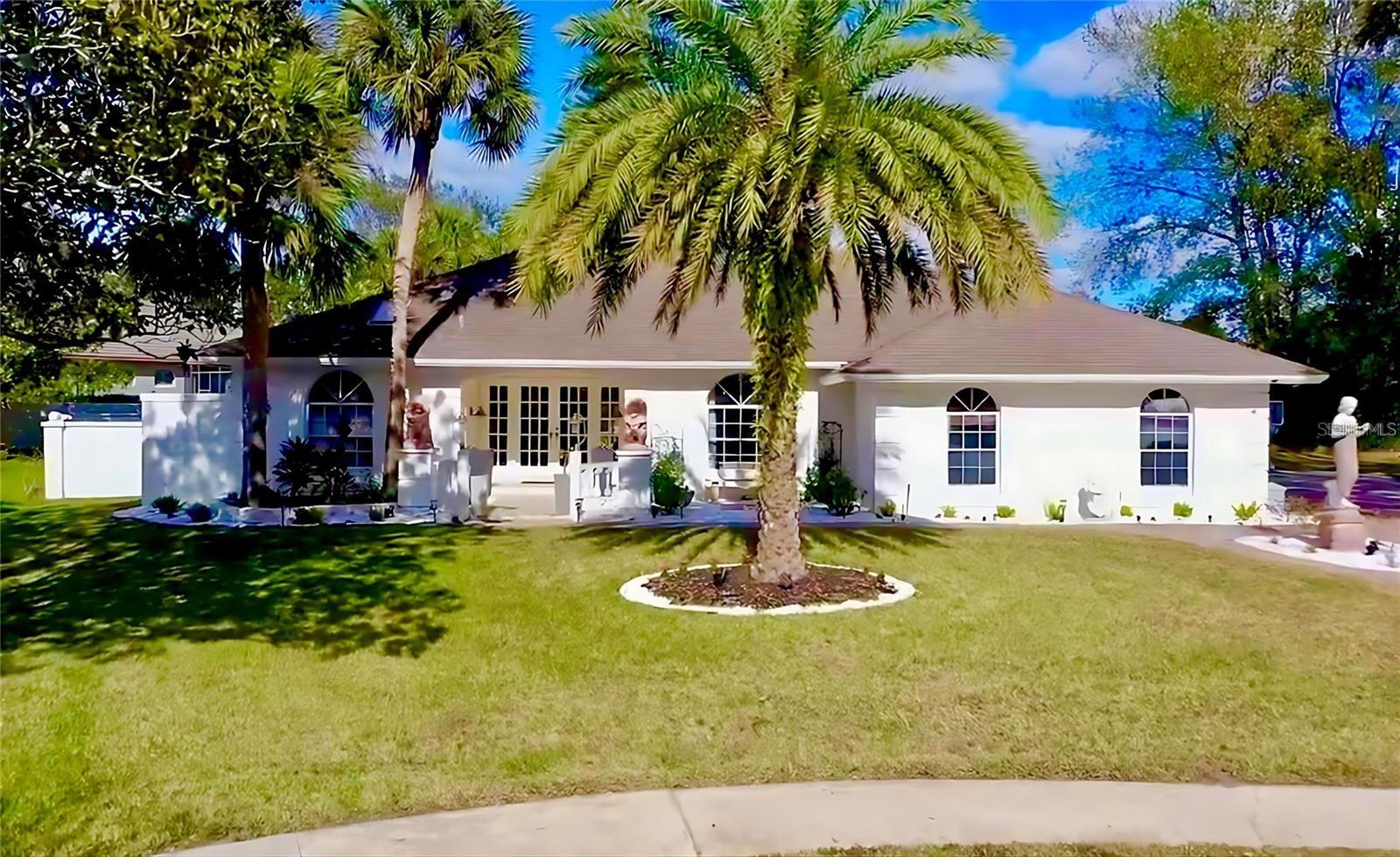 Back on the market at an incredible price! Rare opportunity to live in the world-famous Bay Hill golf community, home of the Arnold Palmer Invitational. With membership, enjoy championship golf, tennis, fitness center, junior Olympic pool, fine dining, and a private lounge. Residents also have access to the Butler Chain of Lakes—ideal for boating, fishing, and enjoying Disney fireworks nightly.
This light-filled home sits on a half-acre lot and features vaulted ceilings, granite tile flooring, and a renovated gourmet kitchen with an imported AGA range. A spacious Florida Room opens to a screened lanai and pool, perfect for year-round entertaining. Updates include new lighting, fans, and toilets. Bathrooms await your personal touch, and the large lot offers space to expand (with ARC approval). Conveniently close to Restaurant row, Disney, Universal, hospitals, and downtown Orlando, this home offers an unmatched blend of lifestyle and value.
