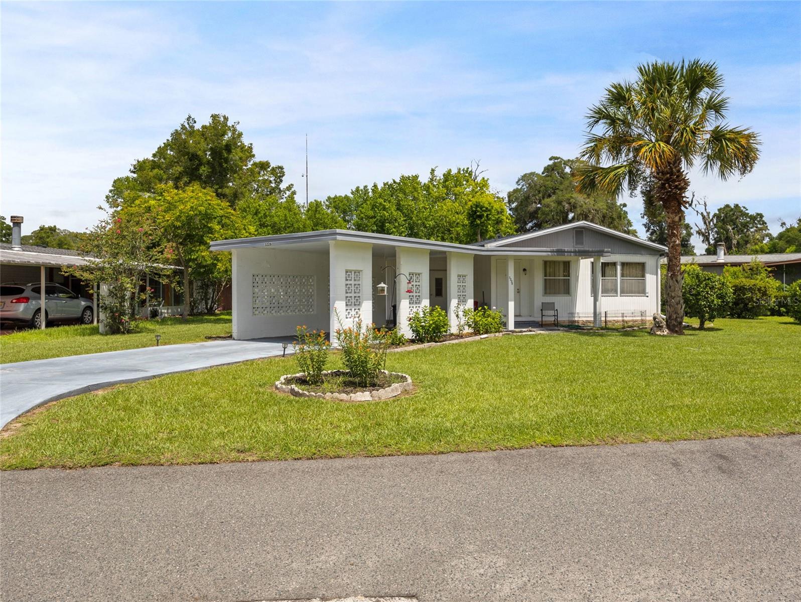 Charming 2-Bed, 2-Bath Double Wide in Oak Park Village – Adult Community
Welcome to this cozy and well-maintained double wide mobile home located in the heart of Ocala, in the peaceful adult-restricted community of Oak Park Village. This 2-bedroom, 2-bath home is move-in ready and packed with recent upgrades, including a brand new roof (2024), new A/C (2024), new water heater (2025), fresh flooring (2025), new exterior back door, and all-new kitchen appliances.
Step outside and enjoy one of the home’s most attractive features: a classic breezeblock carport—perfect for keeping your car out of the weather and ideal for entertaining, cookouts, or relaxing in the shade. There’s also plenty of storage space, including a small workshop area for hobbies or projects.
Oak Park Village offers a tranquil, tree-lined setting with mature landscaping, while being just minutes from Ocala’s best shopping, dining, medical facilities, and more. Whether you're downsizing or simply seeking a peaceful place to call home, this property checks all the boxes.
Don't miss out on this gem—schedule your tour today!