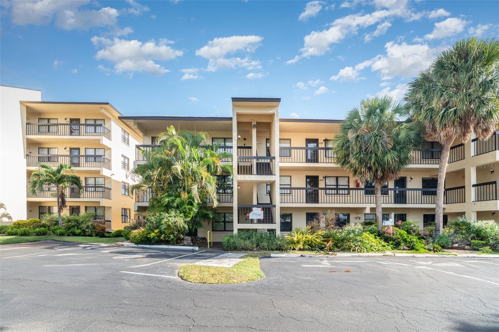 Bring All Offers! Gorgeous lakefront 2nd-floor condo in a gated community, fully renovated and move-in ready! Enjoy panoramic water views from the enclosed Florida Room, plus luxury vinyl plank flooring, newer windows/doors, and a modern chef’s kitchen with granite counters, built-in microwave, and extra storage. Beautifully renovated bathrooms. Features a newer A/C, assigned covered parking, elevator access, and private storage. Resort-style amenities include a heated pool, clubhouse, and shuffleboard. Prime location minutes from shopping, dining, and Gulf beaches. A rare opportunity,don’t miss it!