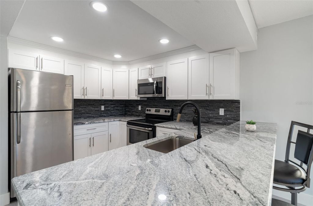 Photo of 425 30th Avenue W #C201, Bradenton, FL 34205 (MLS # TB8414908)