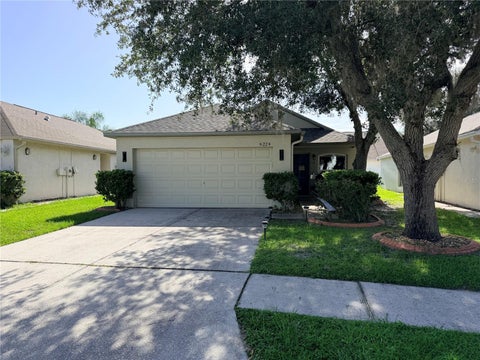 Photo of 6224 Tabogi Trail, Wesley Chapel, FL 33545 (MLS # TB8529675)
