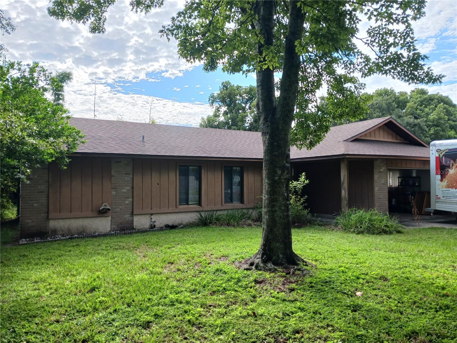 This house has brand new refrigerater, dishwasher, microwave, stove They have never been plugged in . It has one of those huge fifty year old trees in the front yard that shade the whole yard WOW! Since the owner moved out , the whole house has been painted. What a convenient location .