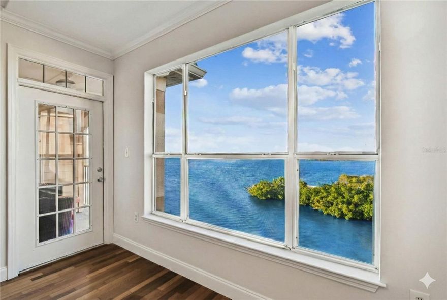 One or more photo(s) has been virtually staged. WATERFRONT TOP FLOOR 2/2 CONDO (Without the Penthouse Price) PLUS the option of owning TWO (2) BOATSLIPS, each outfitted with 9,000 lb & 10,000 lb BOATLIFTS & condo budget has FULL RESERVES!
Let’s be honest: the only thing better than a water view is a water view without a soundtrack of highway traffic. Welcome to the Top Floor of Building 9 at Culbreath Key Bayside Condos in South Tampa. Because you are on the top floor (yes, there is an elevator!), you officially have ZERO upstairs neighbors practicing their tap dancing or bowling skills at 2 a.m. Just peace, quiet, and stunning north-facing views of Old Tampa Bay.
The Goods:
This 2-bedroom, 2-bathroom condo offers living space that feels sleek, modern, and ready for its new owners.
The Kitchen: This isn't your grandma’s oak cabinet situation. We are talking a modern, industrial-chic vibe with stainless steel and wood cabinetry, granite countertops that scream "I know how to cook" (even if you just order takeout), custom stainless steel backsplash, stainless steel Sub-Zero Refrigerator, SS Fisher & Paykel Dishwasher Drawer, SS KitchenAid gourmet wall Range and Microwave, SS Broan Range Hood, SS Built-In Pocket Pantry, and Built-In, Pull-Out Garbage Cans hidden within the cabinets.
The Views: Step out onto your private balcony where the only thing you’ll see is water and mangroves—no cars, no highways - just nature showing off.
The Vibe: Crisp wood-style flooring runs through the living, kitchen and bedroom areas, keeping things clean and contemporary, while the bathrooms are donned with floor to ceiling marble tile.  Both bedrooms have water views and huge walk-in closets and the primary has built-in shelving for additional storage.
The Lifestyle: 
Culbreath Key isn't just a place to sleep; it's practically a resort. We’re talking a gated community, almost ½ mile walking trail that meets up at Sunset Point full of views to get lost in, fitness center (for those New Years’ resolutions), a community dog park (for the fur babies), kayak and paddleboard launch with kayak/paddleboard storage for just $10/mo, a gorgeous clubhouse to reserve for free and a sparkling swimming pool. Naturist? The manatees make Culbreath Key canal home about 10-11 months out of the year, while dolphin, shark, seagulls, cranes, and a variety of fish keep you entertained. Like to Fish? There are designated areas to fish for snook, sheepshead, redfish, drum, jacks, ladyfish, spotted sea trout, Spanish… you name it. Boater? You’re covered with a community boat ramp across the street, and TWO BOAT SLIPS and TWO BOAT LIFTS as a separate purchase (owner owns 2 total for sale). Parking is SUPER GENEROUS with open parking (first come, first served), with COVERED PARKING GARAGE under the same building. 
The "Why You Need This":
It is rare to find an updated 2 bedroom unit in Building 9 in Culbreath Key that faces the bay away from the noise. It’s even rarer to find one on the top floor. This is your chance to live the waterfront life in South Tampa without the noise of the Gandy Bridge.
Details:
Location: 5000 Culbreath Key Way #9-318, Tampa, FL 33611 
Price: $325,000 (Boatslips #41 & #42, both with Boat Lifts at $50,000 each) 
Condo Fee: Includes water, sewer, trash, and lots of amenities 
Call your favorite Realtor today (that's me!) before someone else snags the best view in the complex!