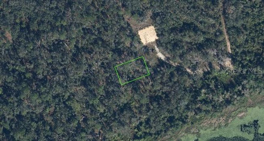 Quarter acre lot available in Orange Blossom Country Club. Build to suit