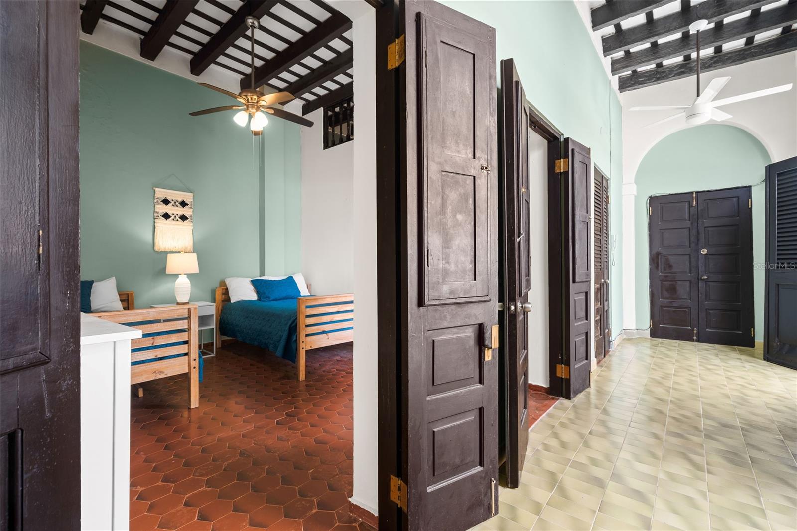 Charming 2-bedroom apartment located on iconic San Francisco Street, right in the heart of Old San Juan. With an open-concept layout overlooking its interior patio, this Airbnb-friendly unit offers a serene retreat steps from Plaza de Armas and some of the city’s best restaurants. Features include a full kitchen, living/dining area, and two comfortable bedrooms. Multiple 24-hour parking lots are available nearby (not included).