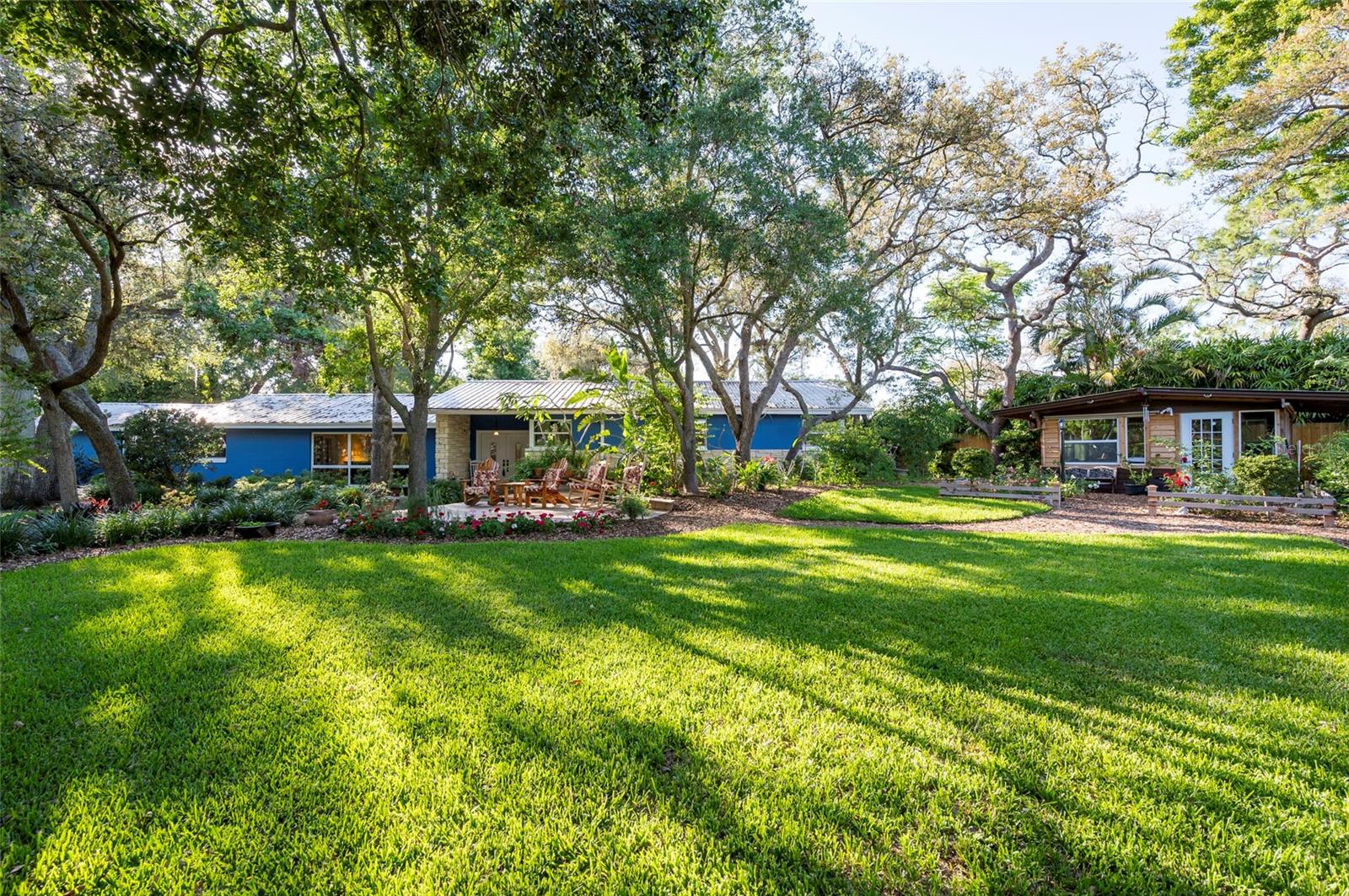 CLEARWATER COUNTRY LIVING – 3,662 sq. ft. of htd space (4,062 gross) on almost ONE ACRE & 500 foot private drive. 5-bedroom, 3-bathroom estate – split plan – can be in-law or home office set up- GARDEN PARADISE/SUSTAINABLE LIVING – 130 feet of ALLEN’S CREEK, multiple decks, landscape lighting. Trees: Live Oak, Maple, Cedar, Moringa, Elderberries, Bananas, Citrus, Mature Grape Vines, large pro garden w/lights, fully irrigated with pump, potting bench with various size pots remain. NEVER FLOODED OR LOST POWER in the storms, custom chef’s kitchen, high-end hickory cabinetry, industrial glides, granite countertops, dual-fuel gas range with vented fan/hood, and wall oven. All SS appliances remain. HURRICANE-RATED VINYL WINDOWS, remodeled bathrooms, quality NEW flooring, & travertine. Outside: rose garden & 250 SF CEDAR SUNROOM CABIN, tree fort, 4 outbuildings, chicken coop & run, SOLAR-HEATED above-ground pool with deck, EMERGENCY POWER SOLAR SYSTEM. County taxes, secluded county living in Clearwater.