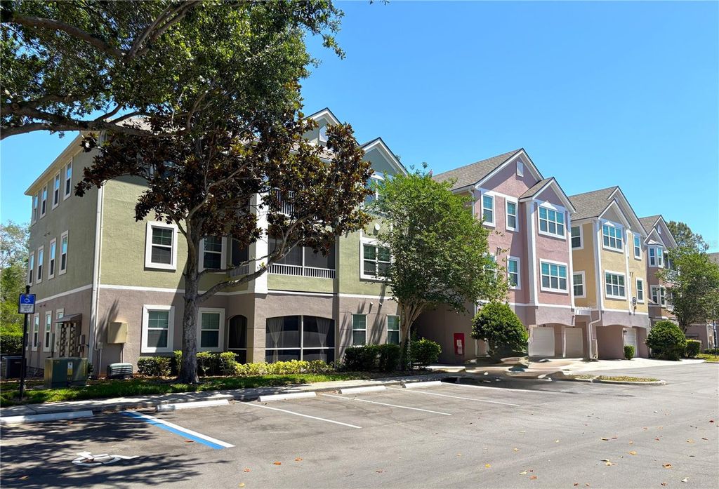 Photo of 6663 Queens Borough Avenue #303, Orlando, FL 32835 (MLS # O6407256)