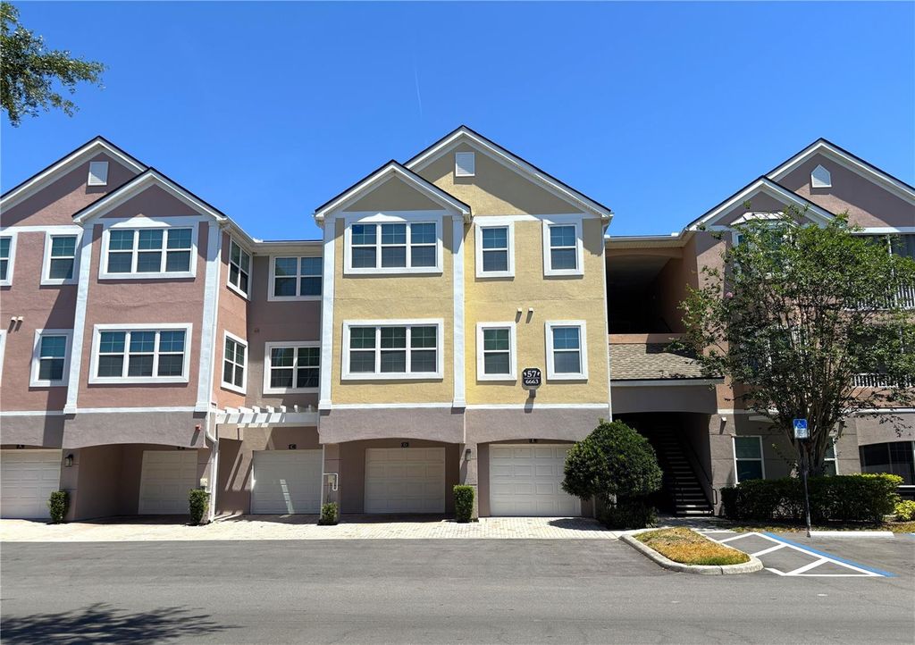 Photo of 6663 Queens Borough Avenue #303, Orlando, FL 32835 (MLS # O6407256)