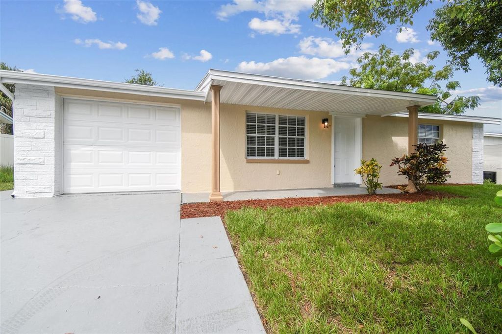 Photo of 9411 Rainbow Lane, Port Richey, FL 34668 (MLS # TB8429764)