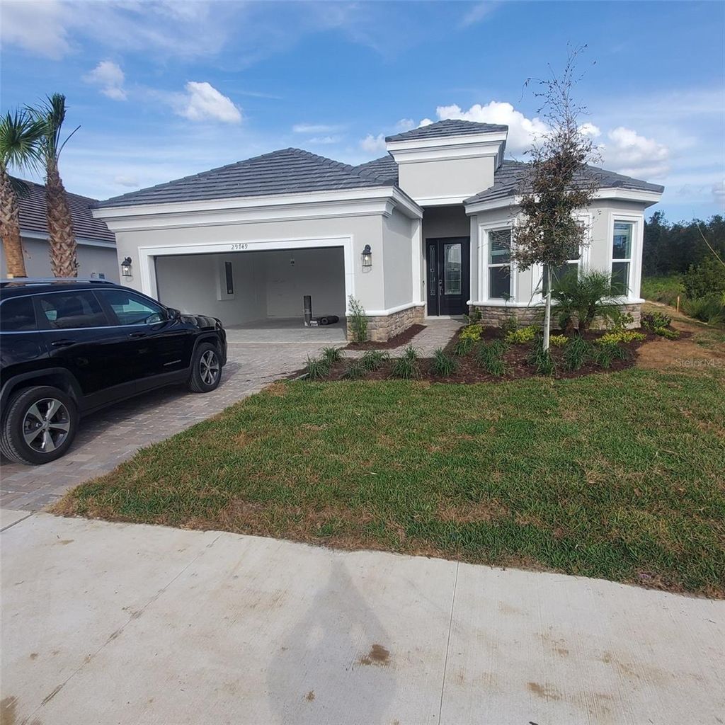 Photo of 29749 Cassino Court, Wesley Chapel, FL 33543 (MLS # J983014)