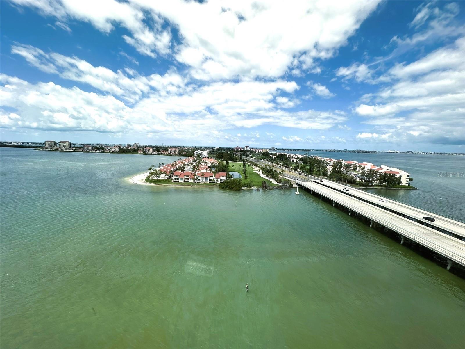 Light & bright, spacious open concept furnished (optional) 1 BR, 1BA condo with fabulous water view overlooking Tampa Bay and Boca Ciega Bay, newer impact Weather Tite PGT windows (2019) and a 55+ community full of amenities! Plush carpet throughout, exiting and vibrant color palette (or may we suggest painting with Sherwin Williams "modern gray" if updating), king bedroom furniture with desk area, walk-in closet, and bathroom with tub/shower combination. Second sink area in bedroom could be removed and used as dedicated home office/planning station space. Kitchen is open to dining/living areas so no structural re-design or pony wall tear-down is needed. Resort style 55+ community offers 4 heated pools, in ground spa, shuffleboard, kayak storage (to be rebuilt), Residents Club with fitness center, sauna, ballroom, poker & other games in the club rooms, billiard room, tennis/pickleball courts, meeting rooms, yoga/group class room, arts and crafts. Building Five has it's own pool area with waterfront dock/boat slips being re-built, new tiki hut & tables & grills. On the corner of Point Brittany near the Resident's Club is "The Country Store" for your convenience, serving prepared foods, specialty meats, fresh vegetables, wine & beer.. Everything you need without leaving the community! Laundry is free to use for residents featuring a full size washer/dryer utility room and a trash shoot on every floor. Large storage unit on same floor, and assigned parking on upper level space #109. Point Brittany is in the perfect location only 10 min drive to St. Pete Beach and 10 min drive to downtown St. Pete. Water/sewer/trash, ext. cable, Internet & WiFi included in monthly HOA fee. One small dog 20 lb. under or 2 cats, 2 quiet birds, or 1 fish aquarium 20 gall or less allowed in Building 5. No motorcycles, RVs or golf carts, residential trucks must fit in parking space and have no lettering/signs. Please verify all rules-regs. CURRENT TENANT VACATING BY OCTOBER 2ND OR SOONER.