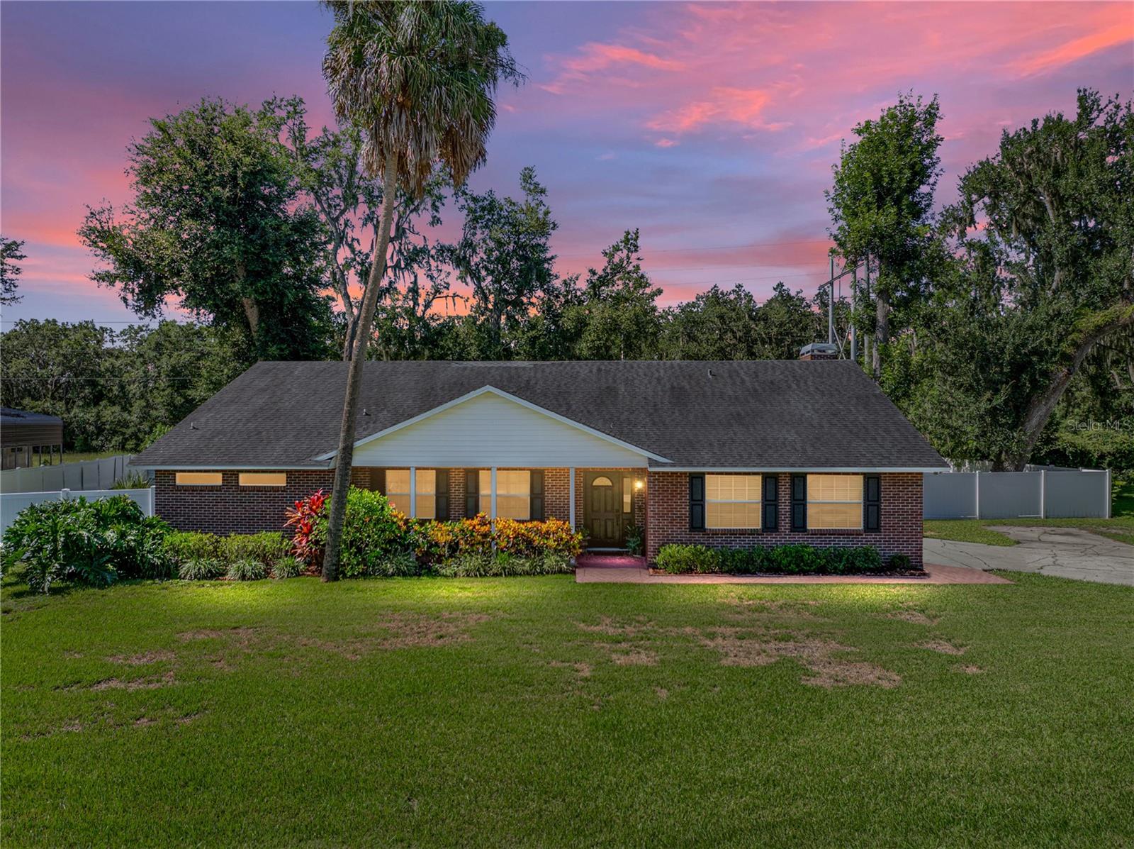 THIS BEAUTIFULY WELL MAINTAINED 4 BEDROOM HOME IS A MUST SEE. CONVENIENT TO TOWN BUT NESTLED IN OAKS AND PALMS . BOTH BATHROOMS AND KITCHEN HAVE BEEN UPDATED. POOL IS SCREENED AND HEATED. MASTER SUITE HAS LARGE SITTING AREA THAT CAN WORK GREAT AS STUDY. WASHER AND DRYER ARE 2023. HVAC UNIT IS 2016. THERE IS A 6X6 WORK AREA IN THE GARAGE FOR ALL YOUR PROJECTS. HOME HAS A GREAT AREA IN THE BACK OF THE HOME TO RELAX AND WATCH THE WILDLIFE OUT BY THE POOL. THE 10X16 SHED THAT SITS ON A FENCED OVERSIZED LOT IS INCLUDED.