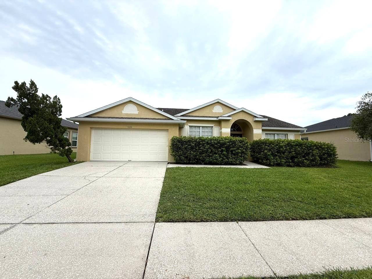 Nestled in the peaceful Lexington Oaks Golf Course Community, this beautifully designed 4-bedroom, 2-bathroom home offers a serene retreat with an open floor plan and a unique layout, highlighted by double entry front doors. As you step inside, youll find a formal sitting area to the left and a formal dining room just beyond, creating a welcoming flow into the main living space. The home boasts elegant tile and wood flooring throughout, complementing the airy and spacious layout. The heart of the home is the open kitchen, featuring crisp white wood cabinets, a fabulous built-in breakfast bar, tons of storage, and a side pantryperfect for entertaining. The cooktop stove is complemented by a separate eating area where you can enjoy family meals while overlooking the tranquil pond view. The living room is just as expansive, making it the perfect space for both relaxation and entertaining. The split bedroom floor plan ensures privacy, with generously sized bedrooms offering ample closet space, all conveniently located just off the kitchen. Retreat to the magnificent master bedroom, which boasts its own en-suite bathroom complete with a standalone shower, garden tub, and dual vanities. The remaining bedrooms share a well-appointed bathroom. Additional features include a washer and dryer for your convenience, an attached two-car garage, and a covered back porch where you can unwind while enjoying the serene water view and expansive backyard. Lawn care and quarterly pest control are included, ensuring a worry-free living experience. The Lexington Oaks community offers exceptional amenities, including a clubhouse, playground, fitness center, recreational area, and a stunning pool complex. Golf enthusiasts will love the community's golf course and club, perfect for a round of golf or socializing with neighbors. Located just minutes from I-75, the Tampa Outlet Mall, Wiregrass Mall, and a variety of major restaurants and highways, this home offers both comfort and convenience. Dont miss out this home will go quickly! In addition to the advertised base rent, all residents are enrolled in the Resident Benefits Package (RBP) for $50.00/month which includes HVAC air filter delivery, credit building to help boost your credit score with timely rent payments, utility concierge service making utility connection a breeze during your move-in, and much more! More details upon application. Sorry, no pets. Vacant and Available Now!