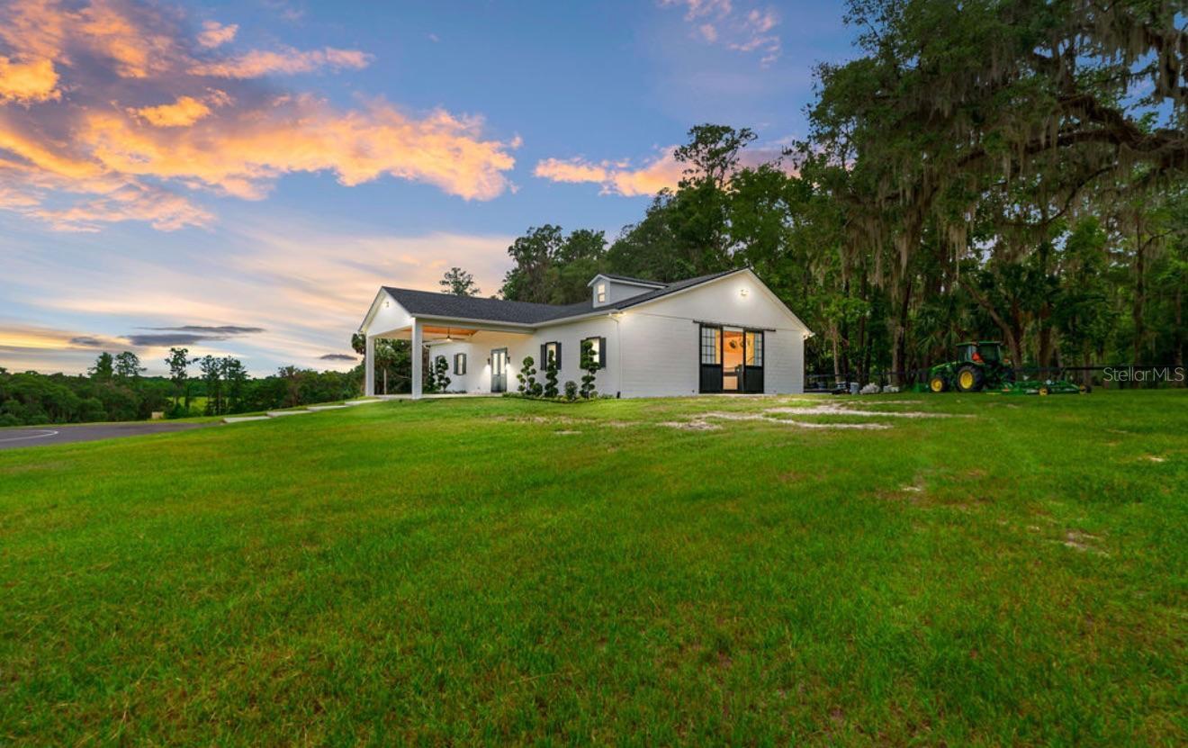 Equestrian enthusiasts and farm lovers, just 25 minutes from the World Equestrian Center you can enjoy the newly built luxury barn at Paradise Farm. Come enjoy the daily sunrises and sunsets alongside some time to fish in the lake down the hill within the 44 acres the farm has. The charming barn with vaulted ceilings was built in 2025 and offers an airconditioned reception area, a generous apartment that sleeps 6 people with a full service bathroom and kitchen, a spacious closet, wifi, water, 5 spacious stalls with their own fans, 5 individual and adjustable four board paddocks, airconditioned feed and tack room, Nelson stall fountains, airconditioned half bath in the barn hallway, 24 hour security cameras, and of course - fully furnished. Access to use the helipad may be granted at an additional cost. Prospective tenants are responsible to bring their own shavings as well as removing all shavings at the end of the lease. The barn is on a separate electric meter so tenant will be responsible for electric. The landlords are considering annual rentals, seasonal rentals, and flexibility to only rent the stalls and paddocks - together or separate. Annual asking rate is $7,500/mo and seasonal asking rate is $9,000/mo. Please call to get rates for the stalls and paddocks individually should you consider that option as well, point of contact is listing agent or Jorge Garcia at (201) 820-8100. Take advantage before it's too late!