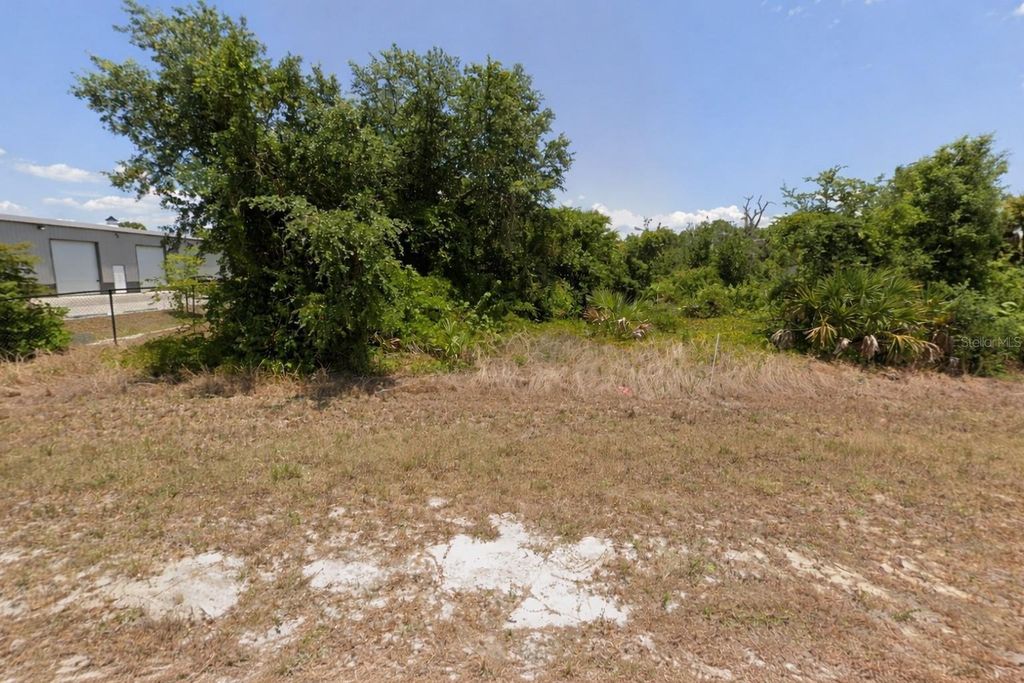 Photo of 10156 Winborough Drive, Port Charlotte, FL 33981 (MLS # C7521146)