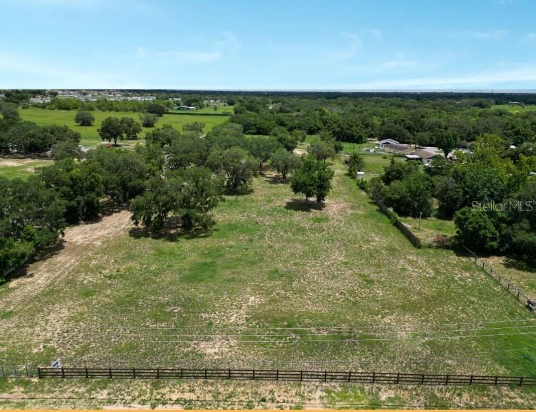 ZONIFICATION R 1 - CHURCH, PRE SCHOOL, FUNERAL HOME are some of many other permited uses and or enough space to built 8 propeties in this Attractive Vacant Land! Invest where there's room for growth! Haines City is a great place to live or invest. Call Today for more information about this ACRES. Walk this lot and you will realize this is the best investment in Polk County. This residentially zoned parcel is primed for the construction of your dream home or multiple homes or explore permited use. NO HOA And NO CDD - 2 miles from Lake Eva Community Center and from Downtown Haines City. This property presents a remarkable opportunity for you to realize your vision