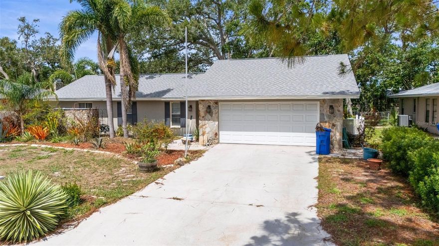 Welcome to Pointe West, come and see this spacious 2 bedroom 2 bath home (1376sf) with lanai overlooking a large shady backyard with plenty of room for a family size pool.  Buyer will be happy to hear that a new roof was installed in AUG 2023, it gets better as the new Air Conditioner was installed in OCT 2022 . Furthermore, newer kitchen stove, fridge and dishwasher were replaced a few years back . More recently, the kitchen, living room, hallway, entry, dining area were all repainted. Pointe West is located about halfway between Manatee Ave and Cortez RD and near Blake. Of course, everyone loves the beach and Anna Maria Island Beaches are just a few miles away. You can bike to the beach or ride the public transport. ($0.75).