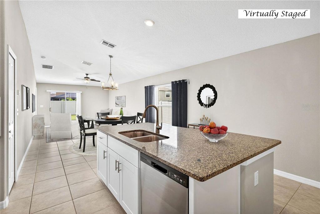 Photo of 9402 Lemon Drop Loop, Sun City Center, FL 33573 (MLS # TB8432778)