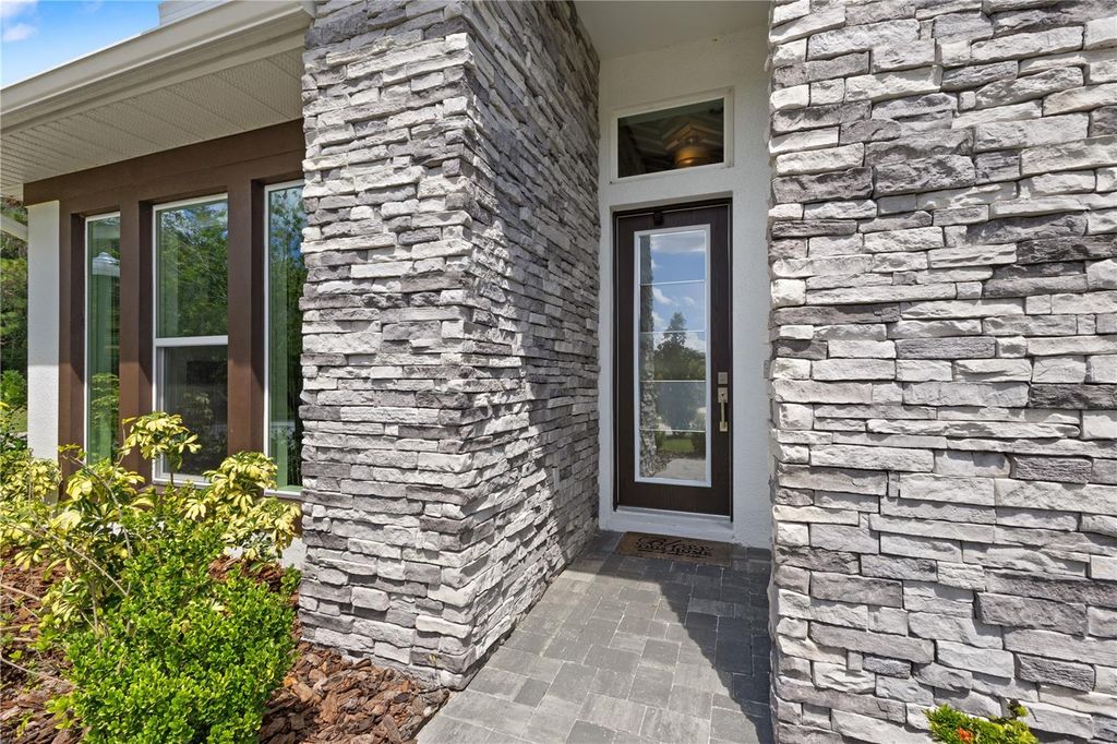 Photo of 13444 Trailing Moss Drive, Dade City, FL 33525 (MLS # TB8417243)