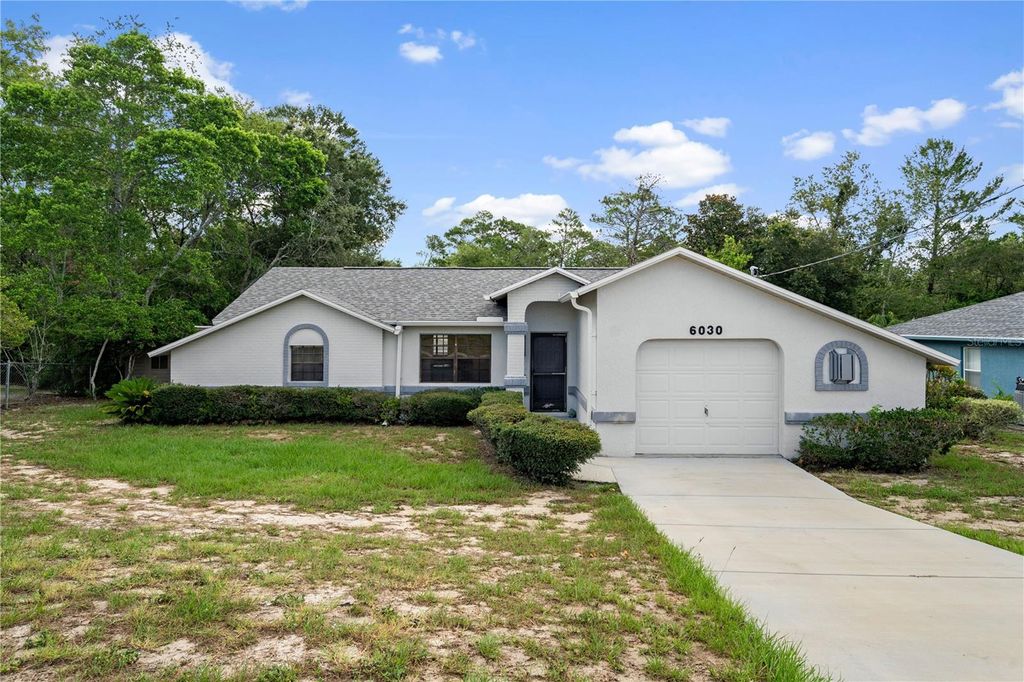 Photo of 6030 Hugo Avenue, Spring Hill, FL 34608 (MLS # W7886838)