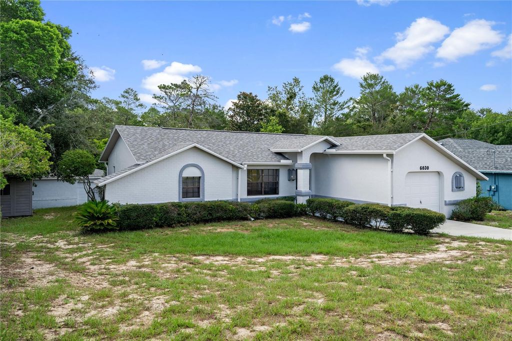 Photo of 6030 Hugo Avenue, Spring Hill, FL 34608 (MLS # W7886838)