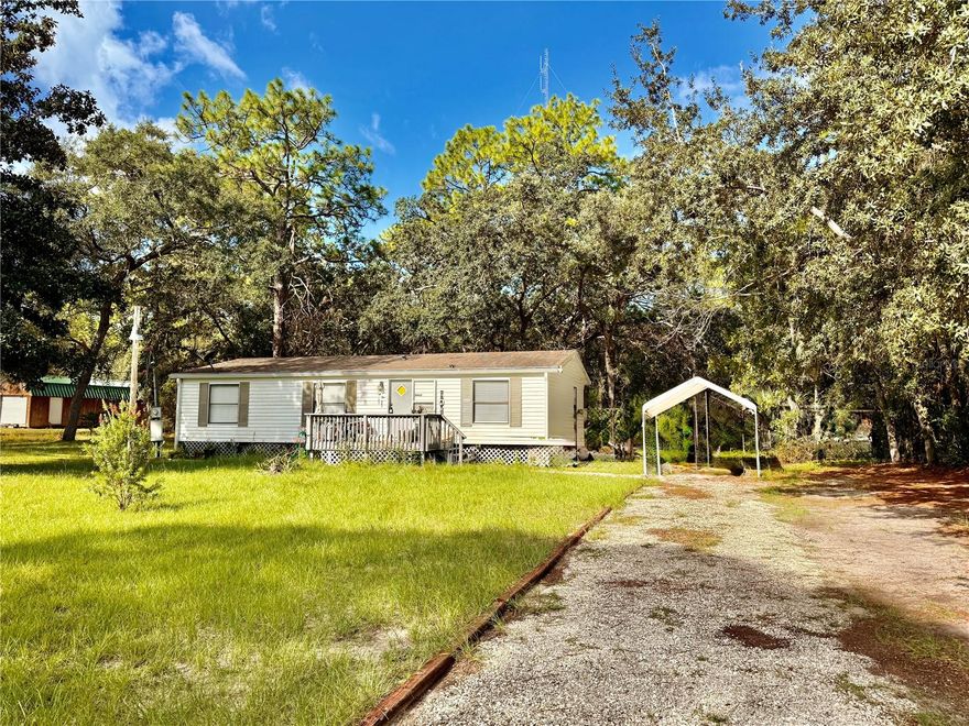PEACEFUL ACREAGE RETREAT IN HOMOSASSA-NO FLOOD INS NEEDED HERE!
COME SEE THIS 1 ACRE 3/2  MOBILE HOME IN HOMOSASSA FL AND DISCOVER THE PERFECT BLEND OF COMFORT AND PRIVACY. SURROUNDED BY TREES AND BOARDERING CONSERVATION, THIS PROPERTY OFFERS A SERENE NATURAL SETTING WHILE STILL BEING CLOSE TO SHOPPING, DINING, AND THE GULF COAST. STEP INSIDE TO FIND A WELCOMING FLOOR PLAN, FEATURING A KITCHEN ISLAND THATS IDEAL FOR COOKING, ENTERTAINING, OR GATHERING WITH FAMILY. LAMINATE FLOORING RUNS THROUGHOUT THE MAIN LIVING AREAS, MAKING THE HOME BOTH STYLISH AND EASY TO MAINTAIN. THE SPLIT FLOOR PLAN PROVIDES PRIVACY FOR THE PRIMARY SUITE, WHILE THE TWO ADDTIONAL BEDROOMS AND A FULLBATH ARE PERFECT FOR FAMILY OR GUESTS. COME AND ENJOY THE OUTDOORS IN YOUR OWN PRIVATE SPACE WITHH PLENTY OF ROOMFOR A GARDEN, PETS OR EVEN FUTURE EXPANSIONS.  WHETHER YOU ARE LOOKING FOR A FULL-TIME RESIDENCE, A SEASONAL GETAWAY, OR AN INVESTMENT PROPERTY THIS HOMOSASSA GEM CHECKS ALL THE BOXES.  BRING YOUR BOAT, RV AND ENJOY THIS IDEAL PROPERTY FOR THOSE WHO WANT TO BE HOA AND CDD FREE!!