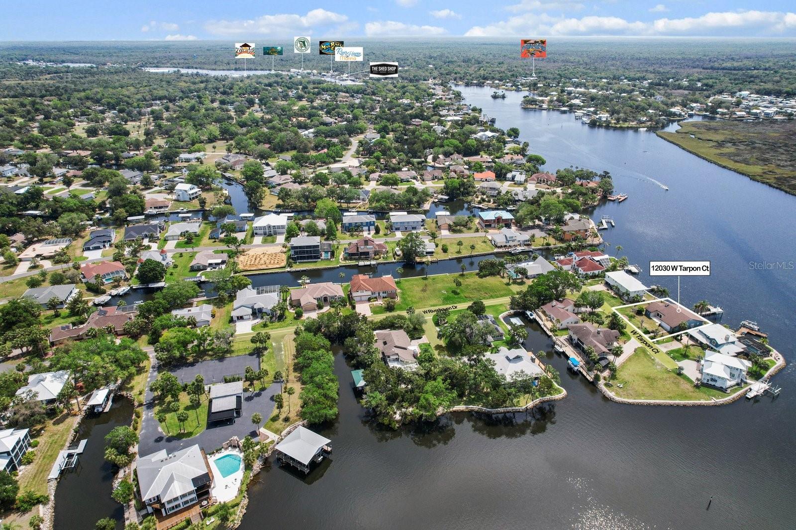 This exceptional home with the most spectacular waterfront views offers 105 feet of water frontage right on the Homosassa River!! With an L-shape 50-foot-long composite deck/dock, 12,000 lb lift, water and power, pilings in place for multiple boats, jet skis, kayak - this is a boater's dream! With two sets of triple sliders (in great room and dining room) you will have a the most spectacular views from every angle in your home. The seller has the original blueprints - the building footprint is approx. 62 feet wide by 60 foot deep, they show the grade beam and pilings sit underneath, and seawall making it easy to take the next step towards remodeling (finished renovating right before the flood) or building up making this property your dream home. Those with offshore boats, you are only minutes away from the Gulf open waters. And be sure to take the family out for sunset cruising or nearby restaurants. Golf Carts are OK too; this home is right down the street from one of Homosassa's favorites - Crumps Landing. As you walk-in to the home, you will be greeted with amazing views of the water and a cozy fireplace to enjoy in the evenings. The floor plan boasts 2,379 square feet of living area. Recent updates include a 2016 roof, 2023 A/C system, and 2020 permitted spa. Riverhaven Village is Golf Cart and pet friendly, offers unbeatable amenities when you join Riverhaven Village Community Club with a one-time deposit of $1,000 dollars and a quarterly fee of $165.00. Great clubhouse parties, heated swimming pool, tennis & pickleball courts, and so much more. Sold AS-IS, ready for your personal touch. Priced to reflect its outstanding potential and premium location. Don’t miss your chance to own a slice of Gulf Coast paradise!