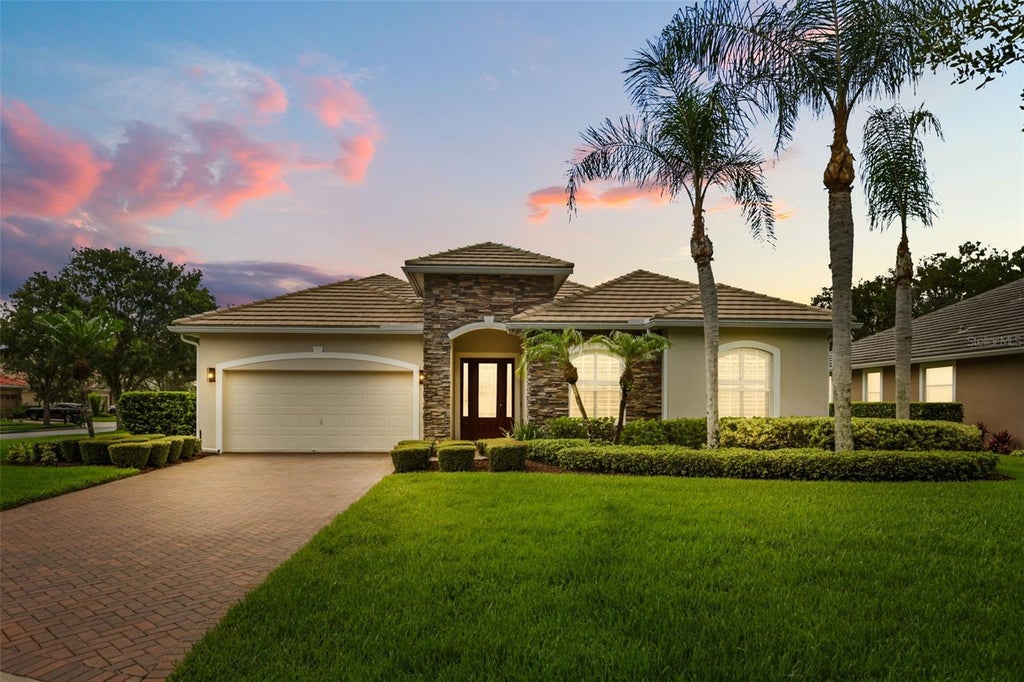 Photo of 843 Wood Briar Loop, Sanford, FL 32771 (MLS # O6422987)
