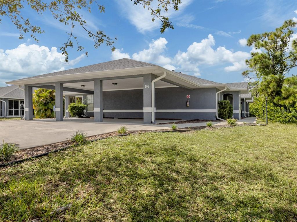 Photo of 209 Boundary Boulevard #212, Rotonda West, FL 33947 (MLS # N6141010)