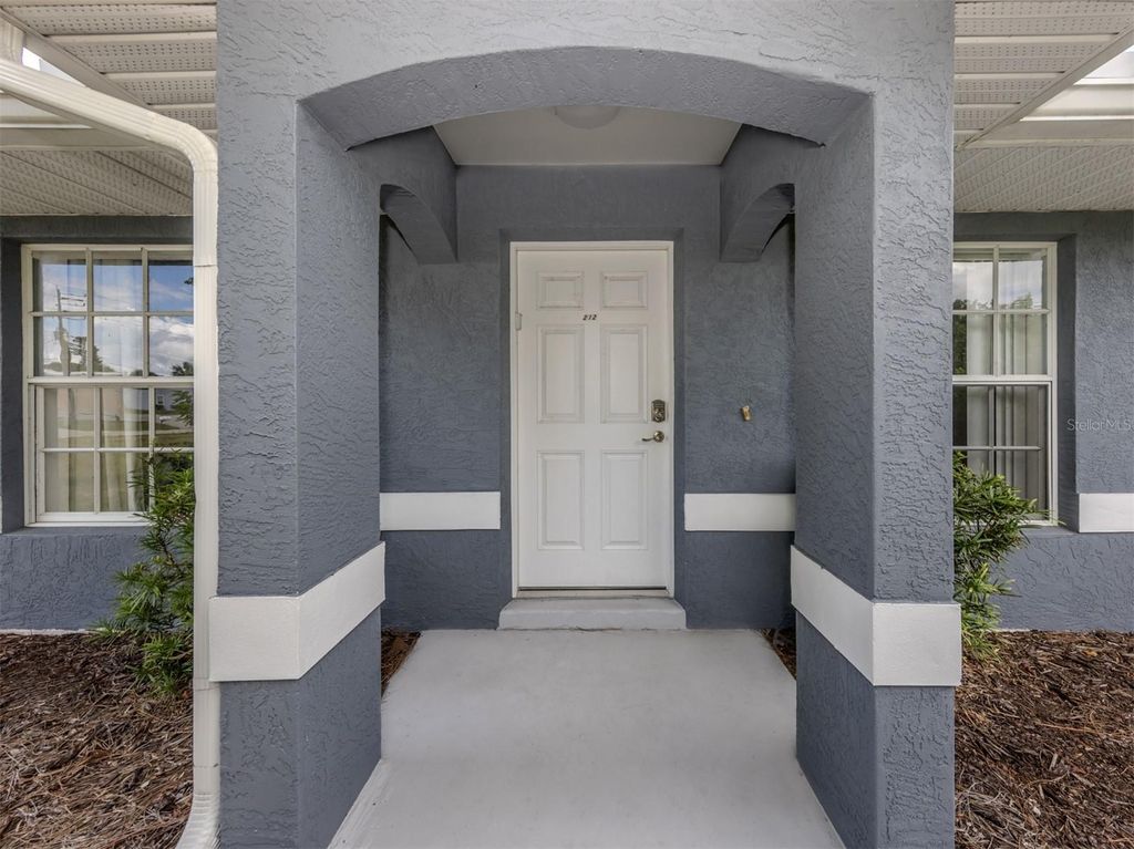 Photo of 209 Boundary Boulevard #212, Rotonda West, FL 33947 (MLS # N6141010)