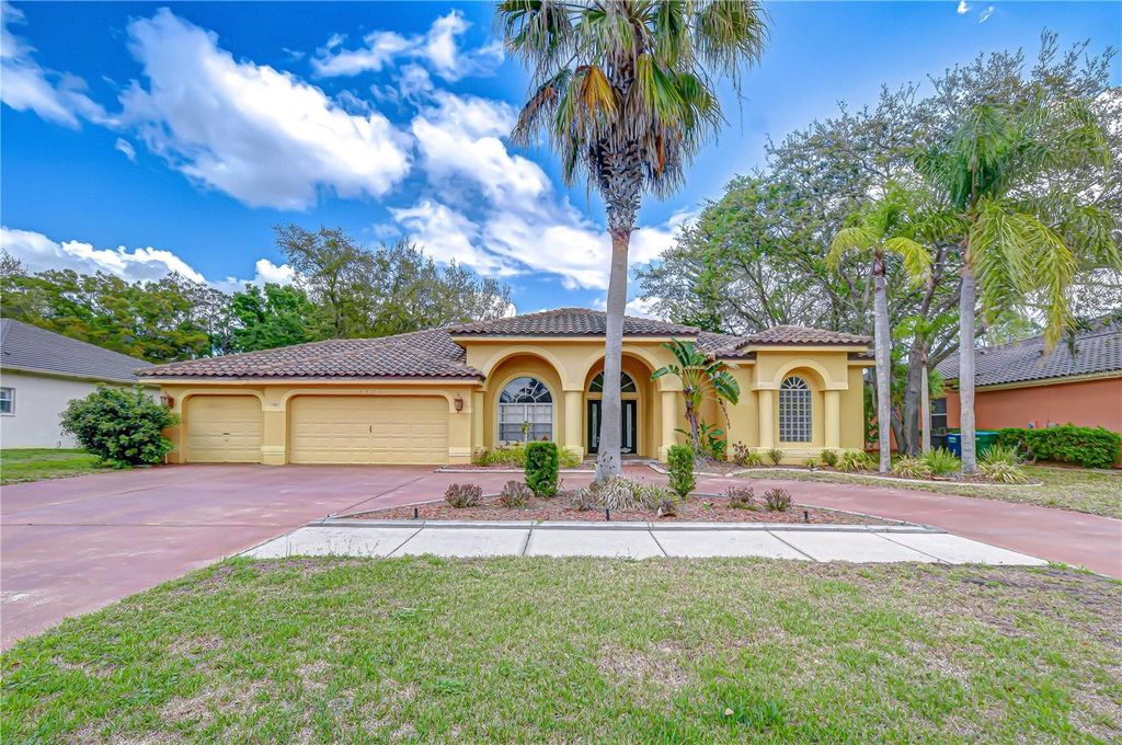 Photo of 3373 Crescent Oaks Boulevard, Tarpon Springs, FL 34688 (MLS # TB8484681)