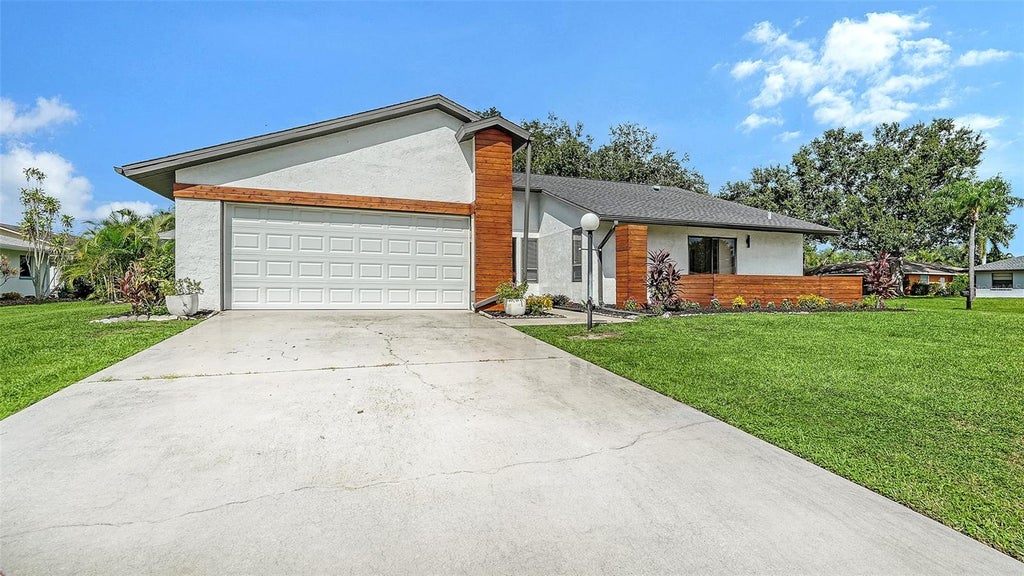 Photo of 5744 Augusta Circle, Sarasota, FL 34238 (MLS # A4707528)