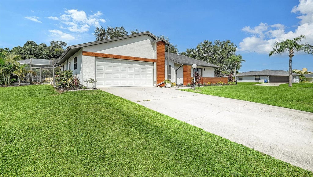 Photo of 5744 Augusta Circle, Sarasota, FL 34238 (MLS # A4707528)