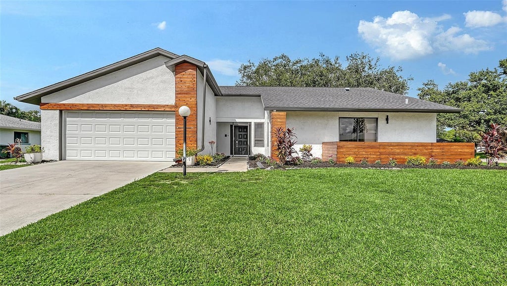 Photo of 5744 Augusta Circle, Sarasota, FL 34238 (MLS # A4707528)