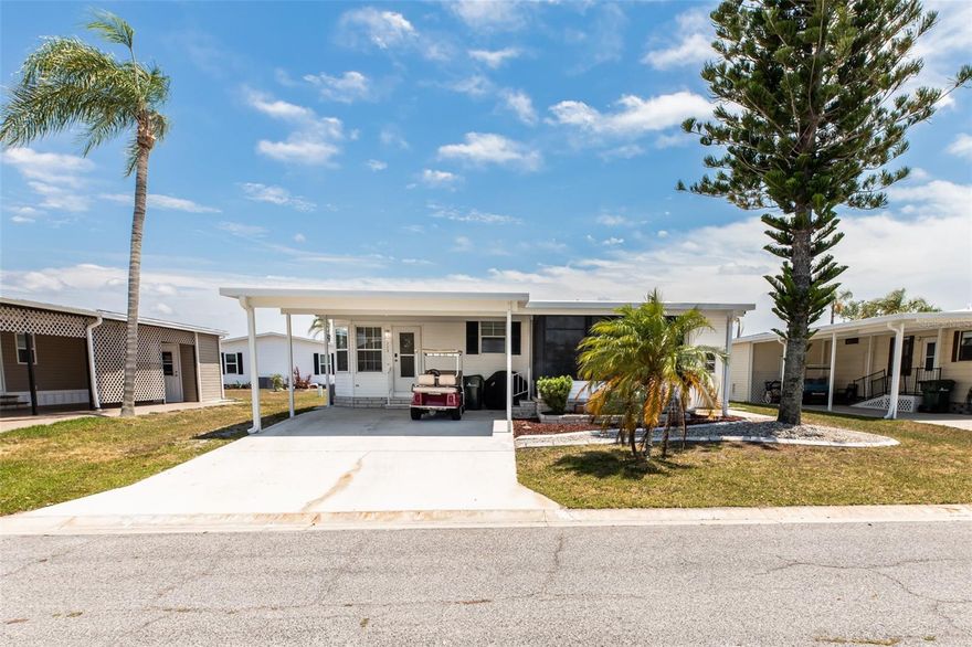 CHARMING FURNISHED 2 Bedroom, 2 Bathroom, Carport manufactured home located in the active 55+ Harbor Cove Community. CLICK ON THE VIRTUAL TOUR LINK 1 FOR THE VIDEO AND VIRTUAL LINK 2 FOR THE 3D TOUR. Spend quality time with friends and family in the open living room while whipping up family favorites in the kitchen. The EAT-IN kitchen offers all-white appliances, granite countertops, a coffee bar, and an off-kitchen dining room. The master bedroom has a walk-in closet and a private bathroom with a single sink vanity and a walk-in shower. The guest room has a built-in closet and a guest bathroom nearby. Expand your living and entertaining space to the screened lanai, where you can sip your morning coffee or unwind with your favorite evening beverage while enjoying the BEAUTIFUL Florida weather. There is a storage room for extra storage space and it doubles as a laundry room. 2024 A/C - 2024 WATER HEATER - 2023 WASHER/DRYER - 2023 RANGE & REFRIGERATOR. Harbor Cove is an active resident-owned WATERFRONT community with a clubhouse, two community pools, an exercise gym, shuffleboard & bocce ball courts, a wood workshop, a private marina, and TONS of resident social events to keep you active year-round! Conveniently located near US 41 for easy access to local shopping, dining, LIVE entertainment, and award-winning beaches. Schedule your private showing TODAY!