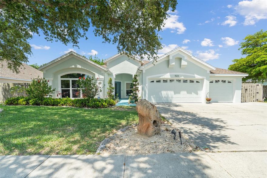 WOW - PRICE IMPROVEMENT! Bring your boat and settle right into this well-maintained home in the popular Island Crossings community in Merritt Island! Perfectly located just minutes from Kelly Park boat ramp, this spacious floor plan includes a 3-car garage and designated boat parking. Sellers spared no expense and offers peace of mind with BRAND NEW hurricane-impact windows/doors, and Storm Buster hurricane panels (2025). Additional improvements include EXTERIOR durable elastomeric paint (2024), A/C (2020), Roof (2018), WATER HEATER (2018), Trex decking, Lush landscaping with energy-efficient LED lighting and eye-catching color-changing spotlights adds charm and visibility. Enter through a gorgeous leaded glass door to an open concept design with high ceilings and plenty of natural light. The formal living room is versatile and is currently utilized as a music room. A formal dining room offers an ideal setting for special meals, while the kitchen showcases granite countertops, a custom tile backsplash, under-cabinet lighting, and newer stainless steel appliances—including a Bosch refrigerator (2022), Frigidaire air fry oven and microwave (2021). For everyday dining, enjoy the separate dinette area or the convenient breakfast bar that overlooks the expansive family room. Designed for privacy and versatility, the 3-way split floor plan includes a bedroom with double doors, perfectly suited as a home office, study, or flex space. The sizeable primary bedroom offers a large walk-in closet, upgraded remote ceiling fan/light, and sliding doors to your lanai. The ensuite bathroom includes split dual sink vanity with granite top, tiled shower, and garden tub for relaxation. Secondary bedrooms are roomy with two sharing a Jack-n-Jill bathroom. A fourth bedroom is located on the opposite side of the home, along with a bathroom that leads to the lanai. For outdoor living, a fully fenced backyard backs to a conservation/greenbelt and can be enjoyed year-round from the expansive screened-in lanai, complete with a fireplace and built-in pizza oven. Additional features include: Luxury vinyl flooring in the formal living room and office/bedroom, contemporary lighting and ceiling fans throughout, a well-appointed interior laundry room with sink, and ample storage space in the 3-car garage add to the home's functionality. Island Crossings is conveniently located to the Beachline Expressway, Port Canaveral, Kennedy Space Center, shopping, dining, and just minutes to the beach. Don't wait for a chance to experience the best of island living! Call today to schedule a private showing.