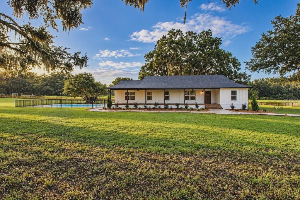 Photo of 3276 County Road 216, Oxford, FL 34484 (MLS # GC543875)
