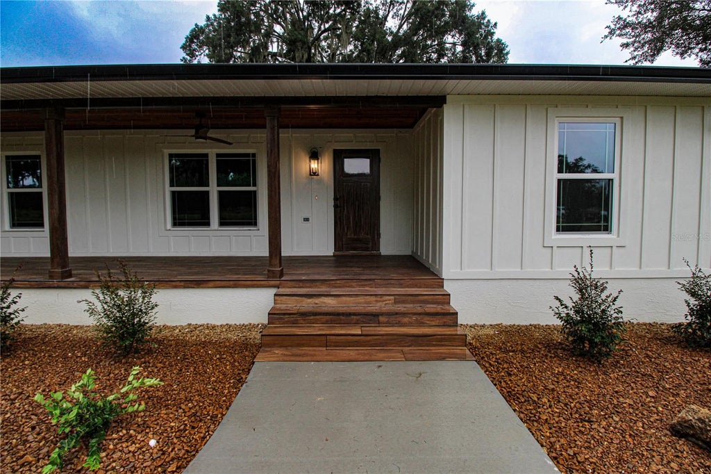 Photo of 3276 County Road 216, Oxford, FL 34484 (MLS # GC543875)