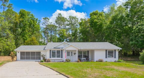Photo of 8067 SW 116th Loop, Ocala, FL 34481 (MLS # OM723382)